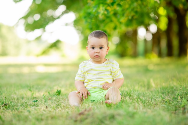 Baby boy on a walk in the park