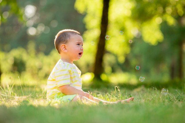 Baby boy on a walk in the park