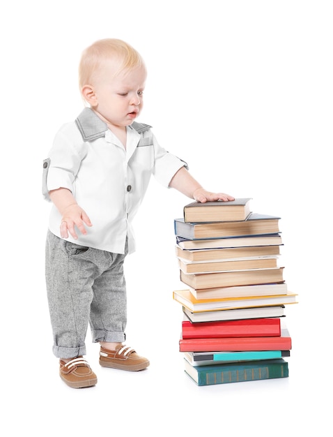 Baby boy with books isolated