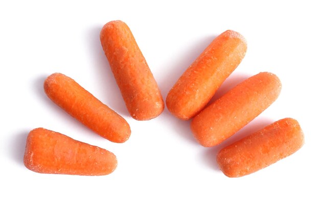 Baby carrot sticks isolated on white