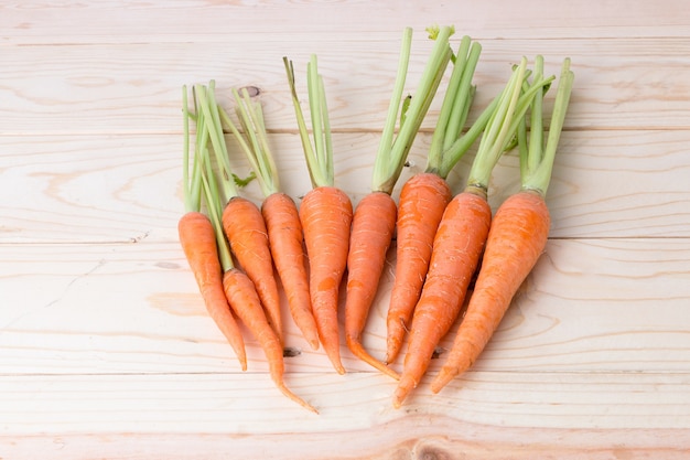 baby carrot on wood table