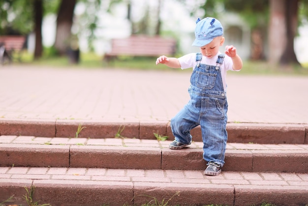 baby child on a summer walk in the park