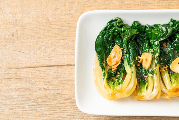 baby Chinese cabbage with oyster sauce and garlic - Asian food style