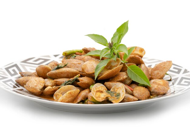 baby clams in red curry on plate isolate on white background