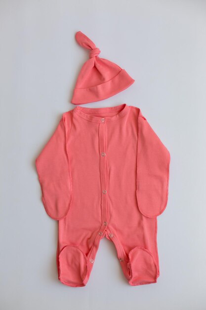 Baby clothes in coral and pink