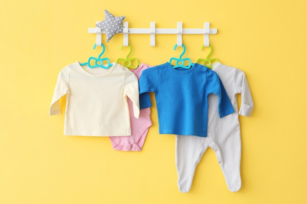 Baby clothes on a hanger place for text minimalism