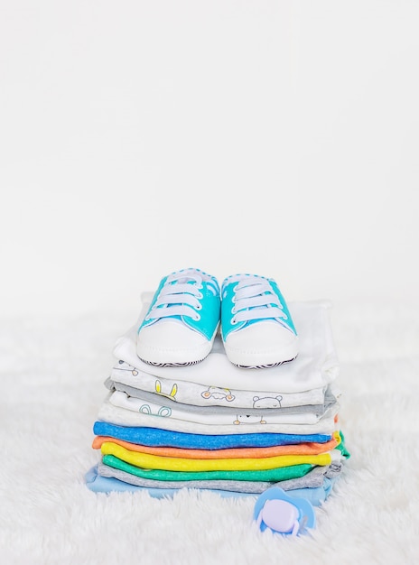 Baby clothes on a white