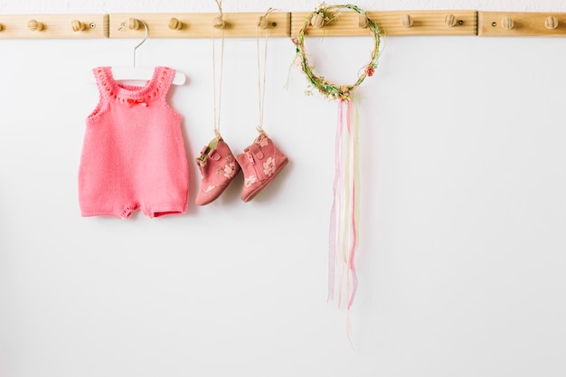 Baby clothes and wreath