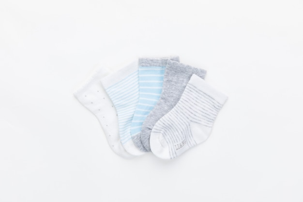 Baby colorful socks isolated on white background.