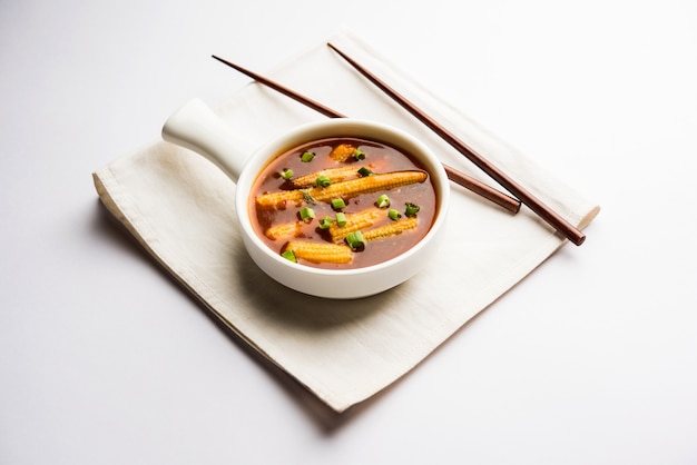 Baby Corn Manchurian with gravy - popular Indo-chinese recipe. selective focus