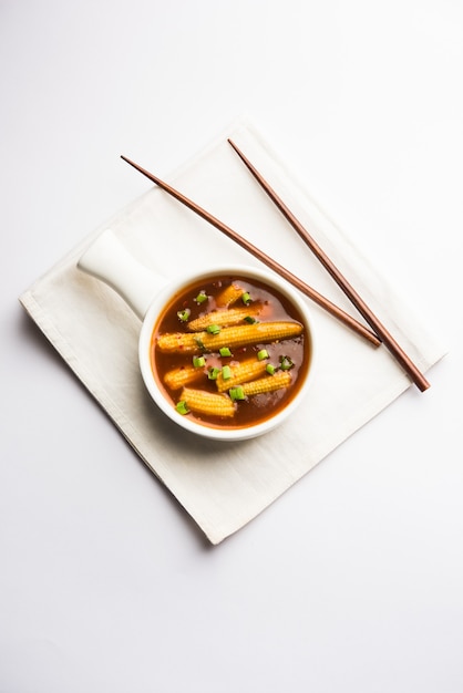 Baby Corn Manchurian with gravy - popular Indo-chinese recipe. selective focus