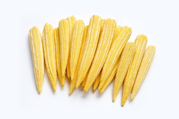 Детская кукуруза на белом фоне