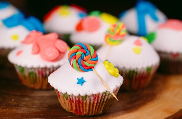 Baby cupcakes on wood