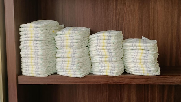 Baby diapers stacked on the shelf