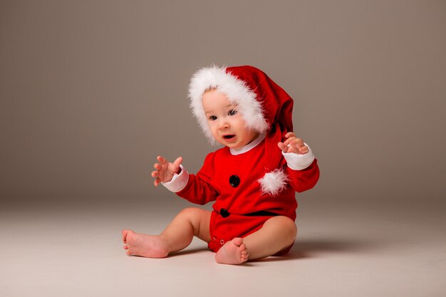 Baby dressed like Santa