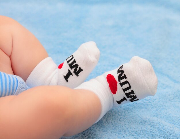 Baby feet socks inscription I love Mommy