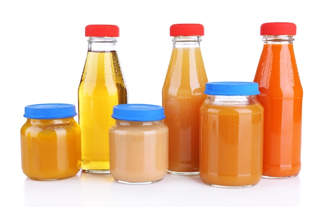 Baby food in glass jars isolated on white