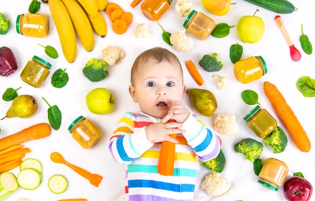 Baby food puree with vegetables and fruits. Selective focus. nutrition.