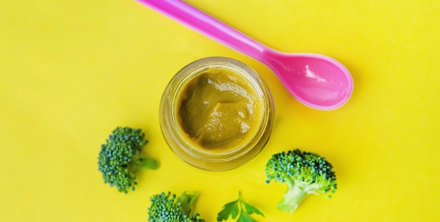 Baby food in small jars. Selective focus.