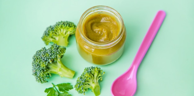 Baby food in small jars. Selective focus.