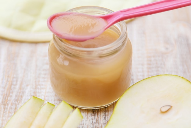 Baby food in small jars. Selective focus.