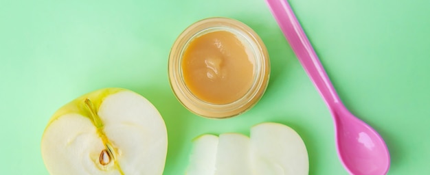 Baby food in small jars. Selective focus.