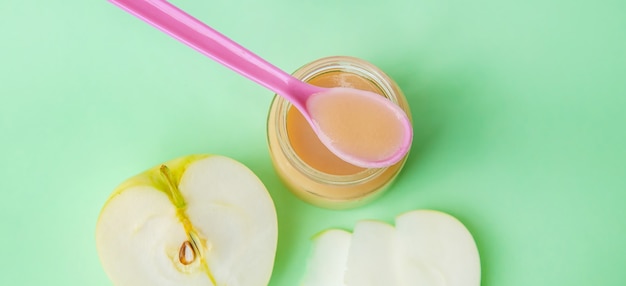 Baby food in small jars. Selective focus.