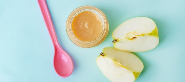 Baby food in small jars. Selective focus.