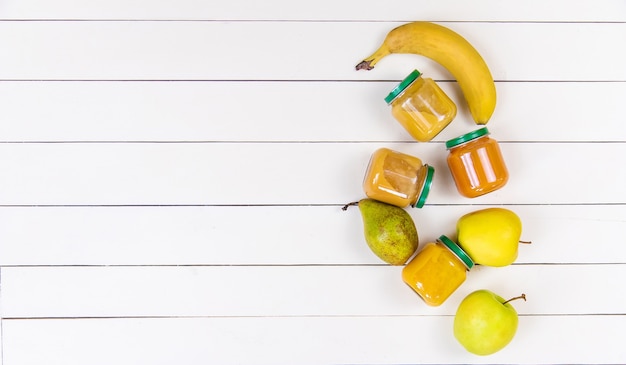 Baby food on a white background. Selective focus