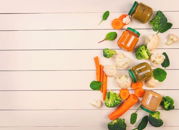 Baby food on a white background. Selective focus