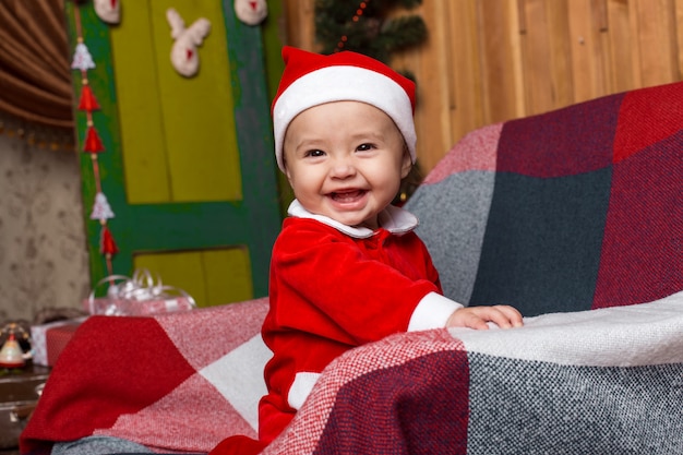 Baby girl as Santa Claus