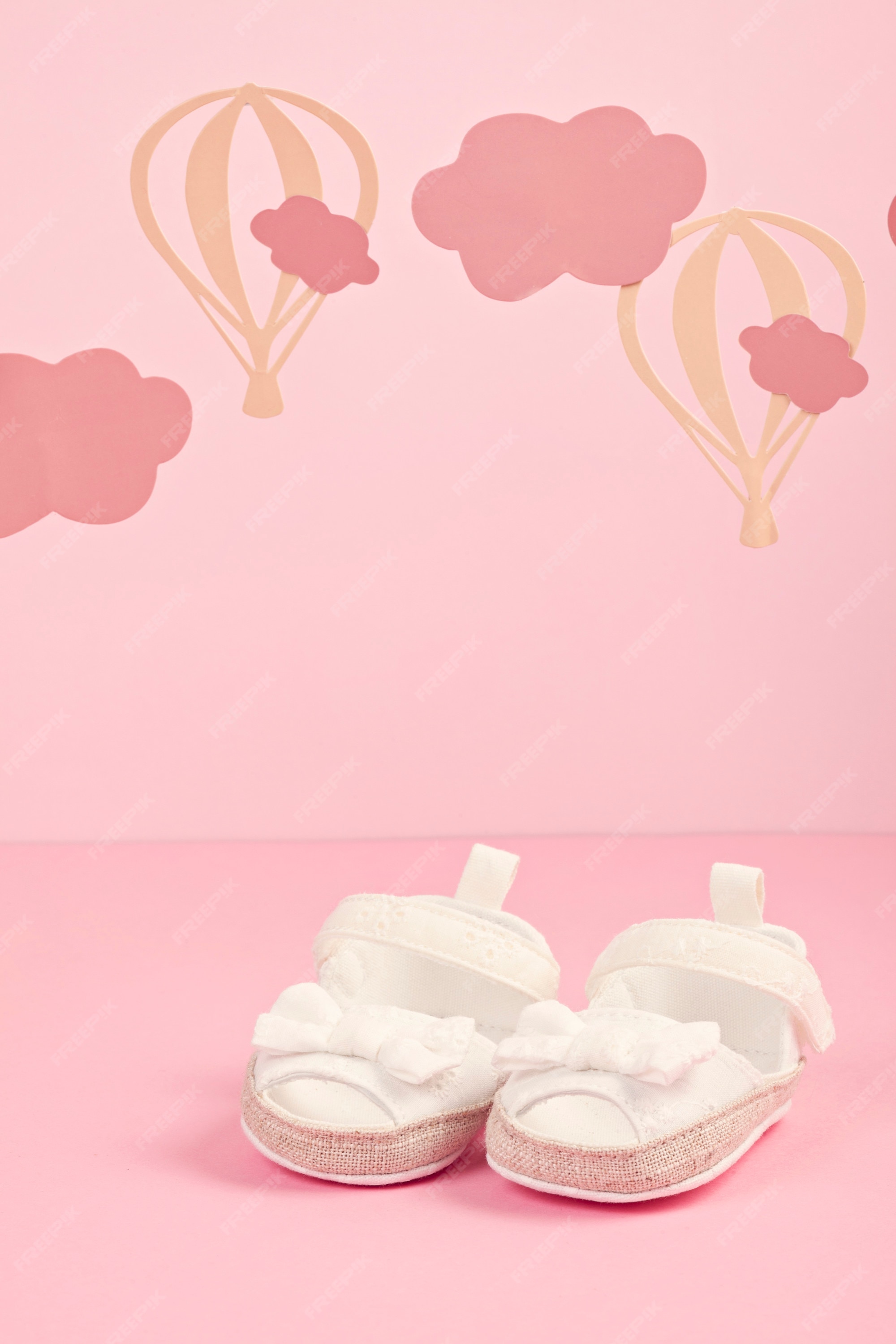 Premium Photo | Baby girl cute pink shoes over the pink pastel ...