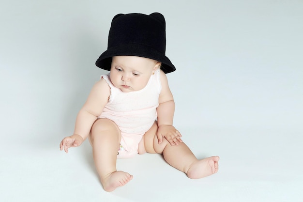 Baby girl in hat little funny child newborn