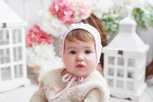 Baby girl in hat with wooden toys Postcard Mother's Day and Easter Children Protection Day