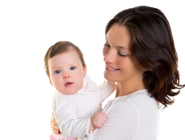 Baby girl hug in mother arms on white