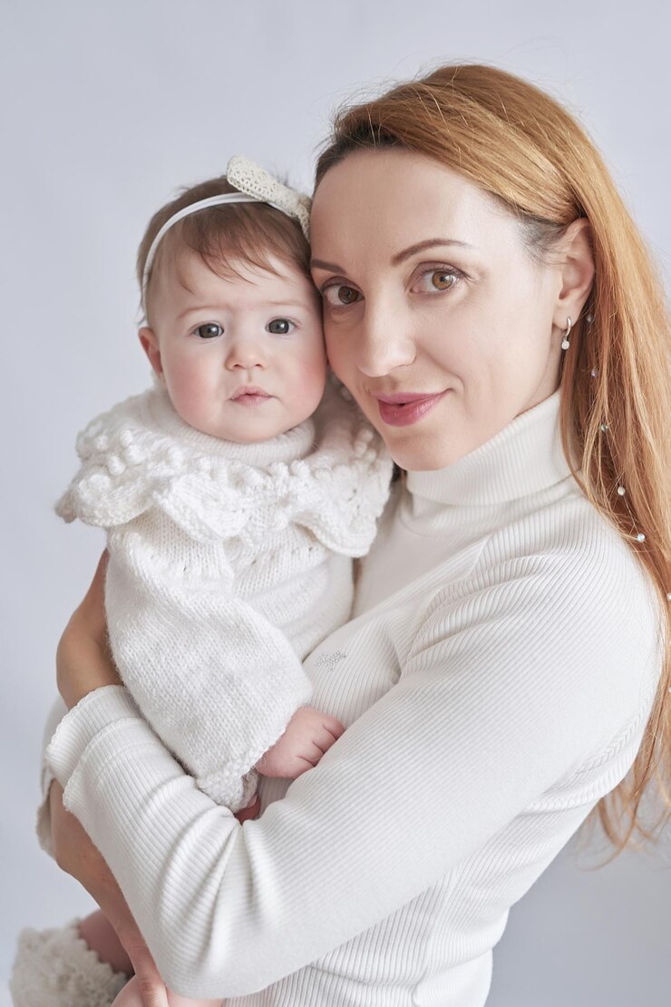 Baby girl in mother's arms Postcard Mother's Day and Easter Children Protection Day