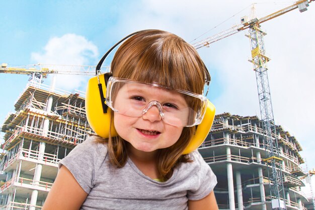 Baby girl with working tool