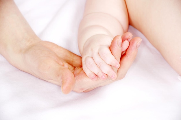 Baby hand isolated on white