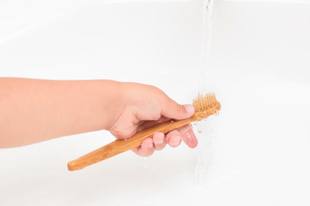 Baby hand wash bamboo toothbrush in the bathroom