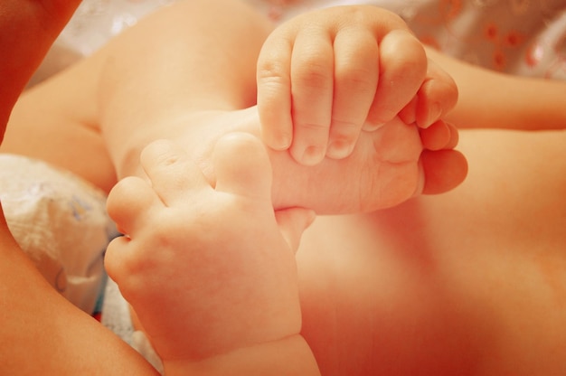 Baby hands and feet closeup