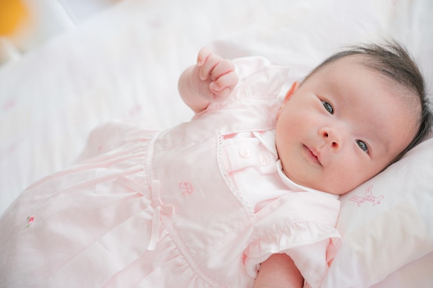 Baby in roze kleren