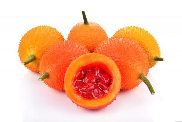 Baby Jackfruit, Spiny Bitter Gourd, Sweet Grourd or Cochinchin Gourd on white background