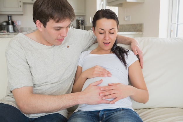 Photo baby kicking in mother's stomach