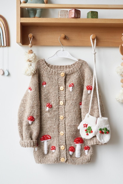 Photo baby knitted clothes handmade knitted sweater with fly agaric mushrooms jacket with embroidery