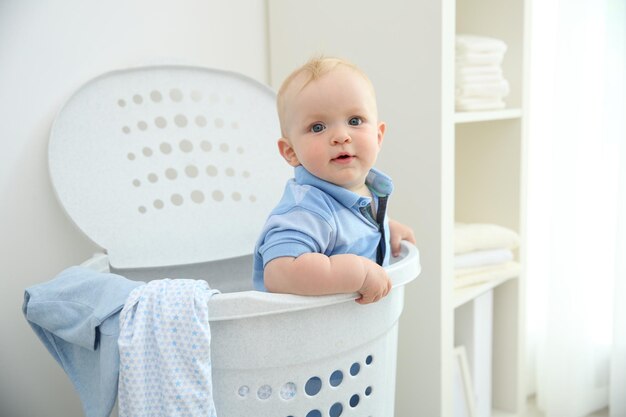 Baby in laundry basket