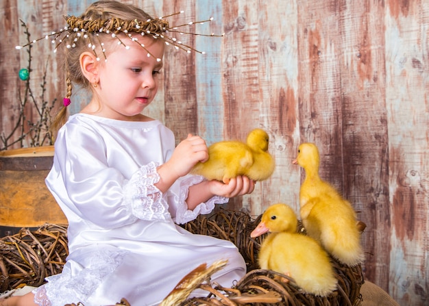 Baby and little yellow duck