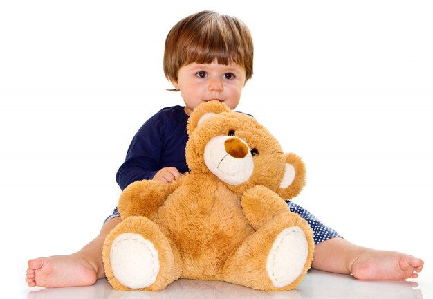 Baby met teddybeer