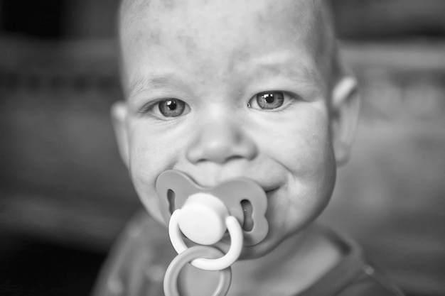 Baby newborn with pacifier cute baby