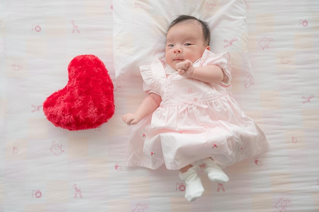 Baby in pink clothes