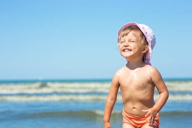 Baby playing on the beach